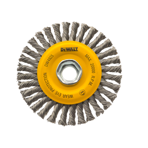 Close-up of DeWalt DW4925 4-inch stringer wire wheel brush showing twisted carbon-steel knots, yellow hub, and 5/8-11 arbor rated to 20,000 RPM.